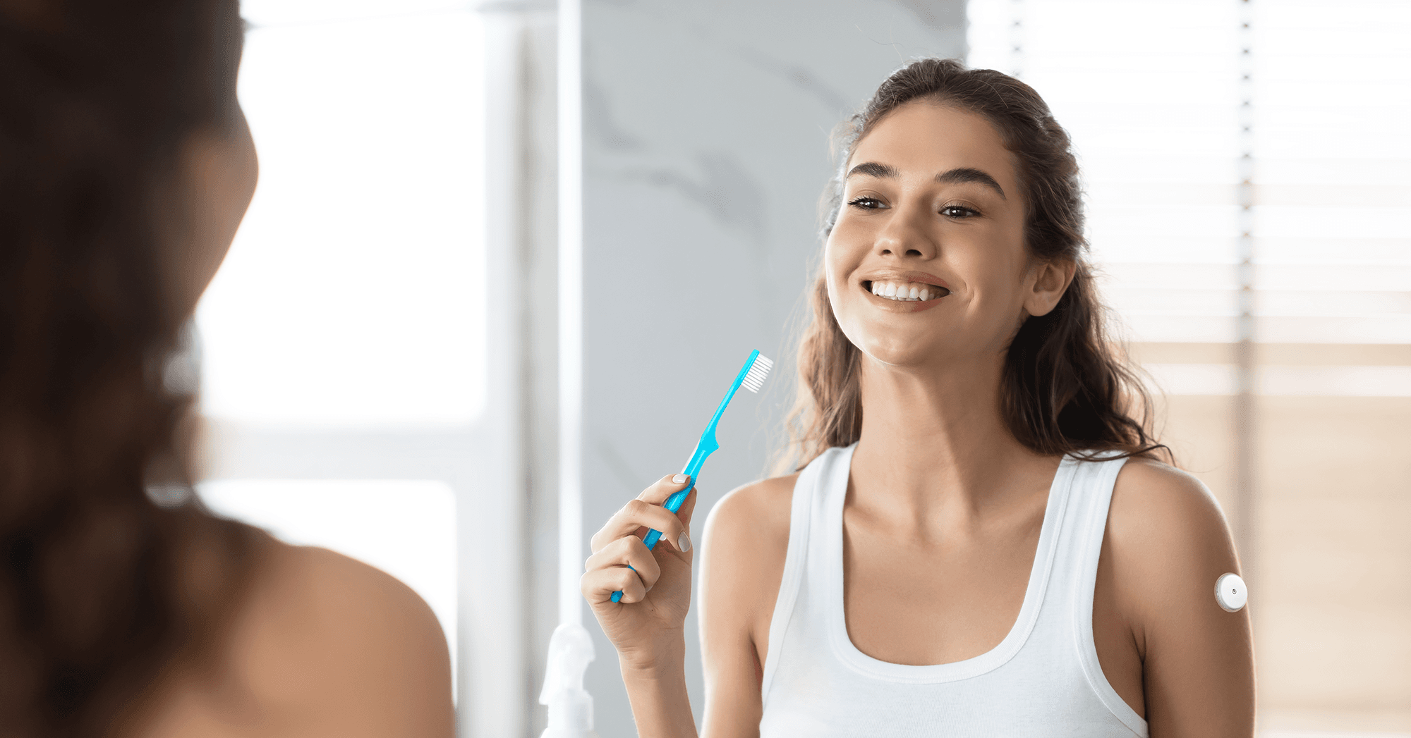 Woman with diabetes brushing her teeth